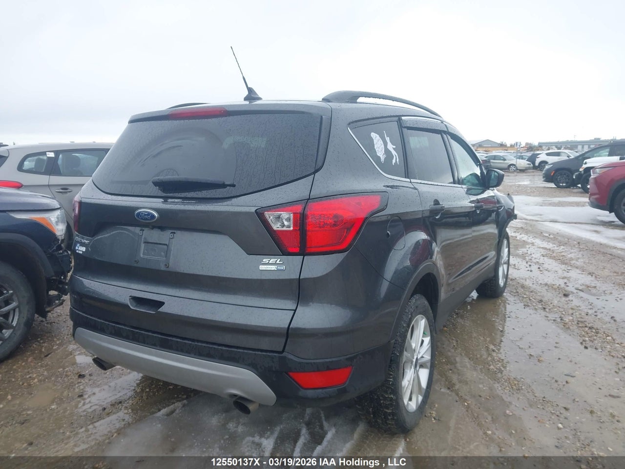 Image #/images/mount/1FMCU9HD1KUB17087_04.jpg for vehicle